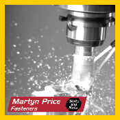 A machine is cutting a hole in a piece of metal.