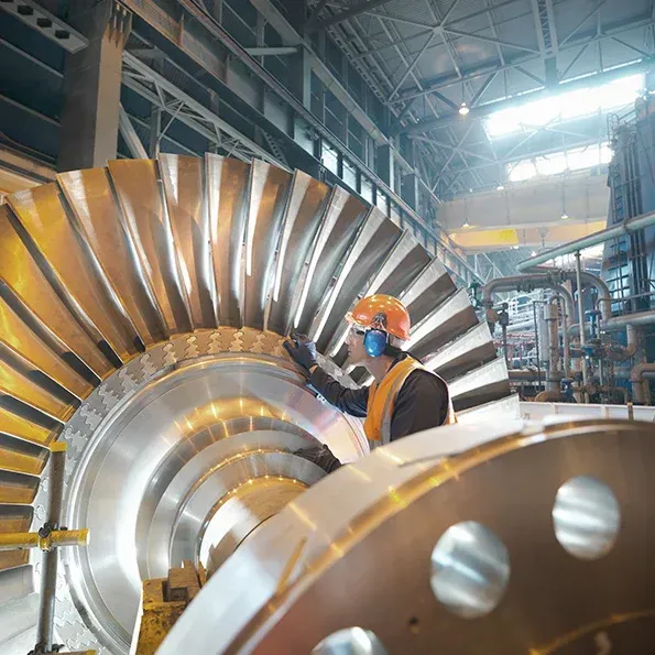 Two washers are stacked on top of each other on a white background
