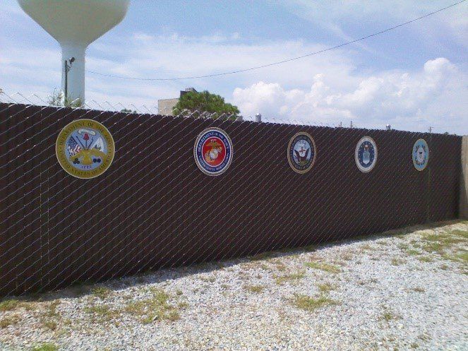 Chain Link Fence with Military Emblems — Navarre, FL — The Fence Company