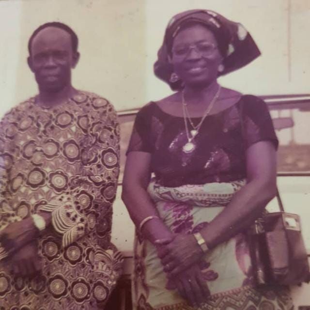A man and a woman are posing for a picture together