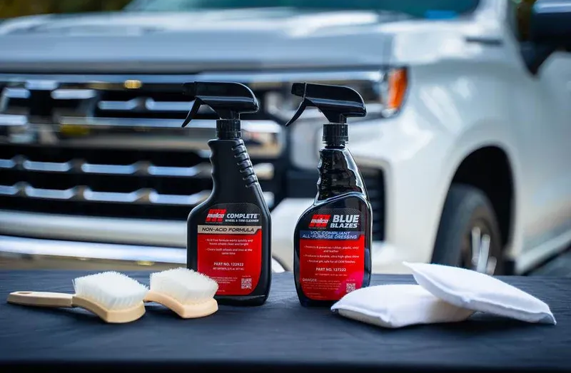 A wooden fence with a gate attached to it.