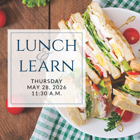 a plate of sandwiches on a table with the words lunch & learn on it