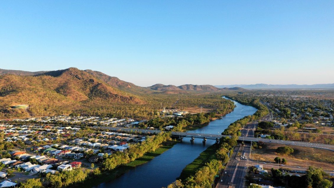 River Flowing Through A Town — All Grind & Coat in Port Douglas, QLD