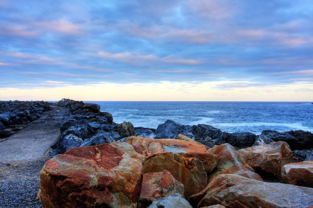 Rocky Shoreline With A Stone Walkway — All Grind & Coat in Northern Beaches, NSW
