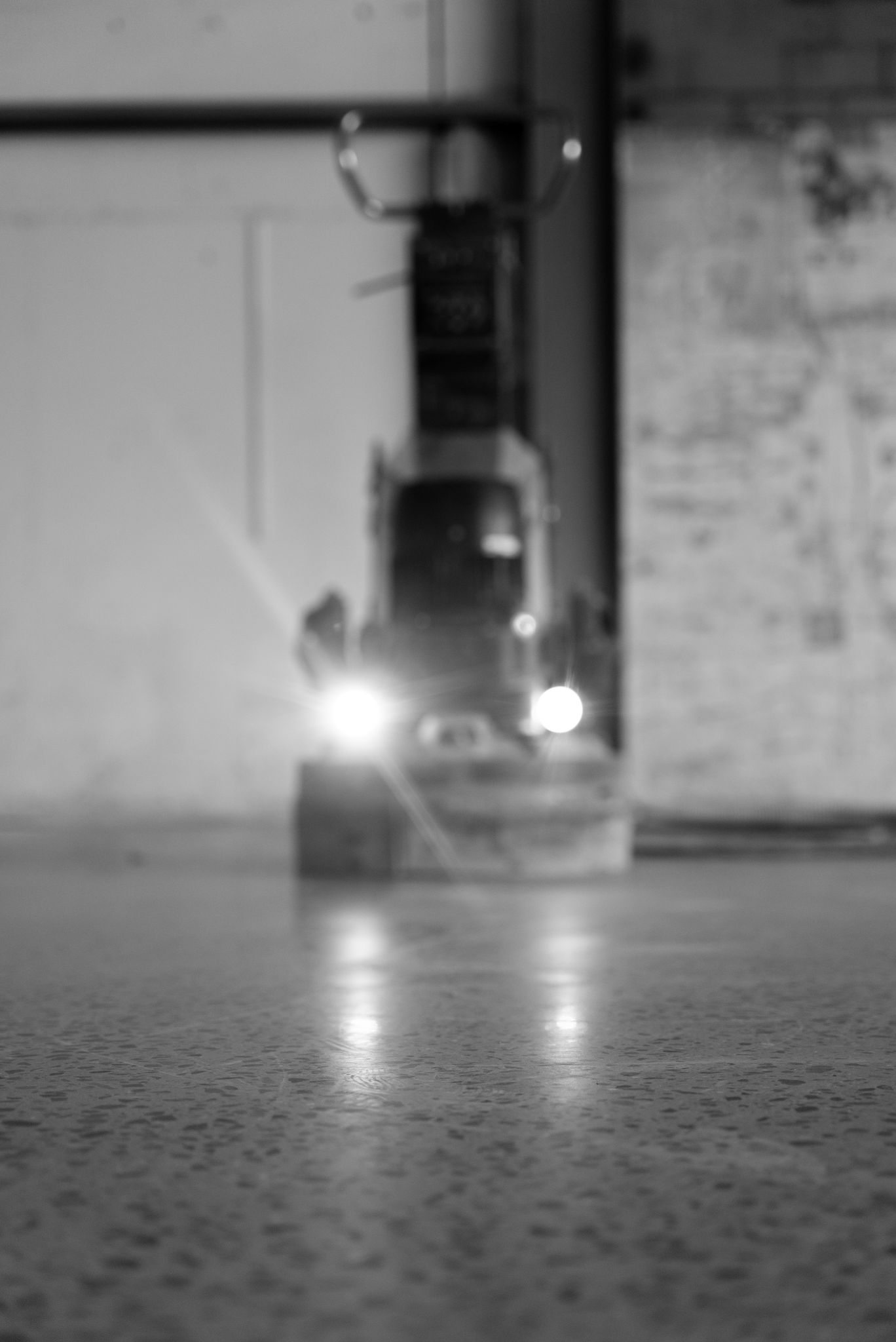 A close up of a machine grinding a concrete floor — All Grind & Coat in Cairns, QLD