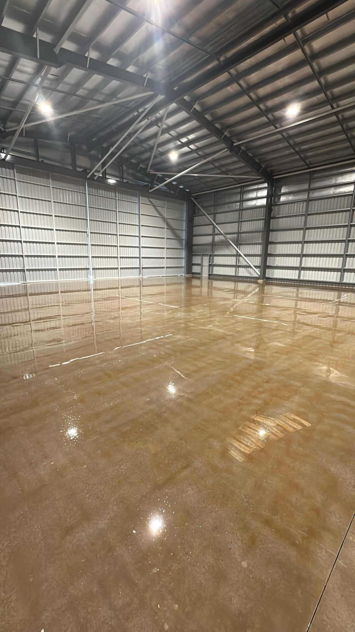 Empty Warehouse With Polished Concrete Floors