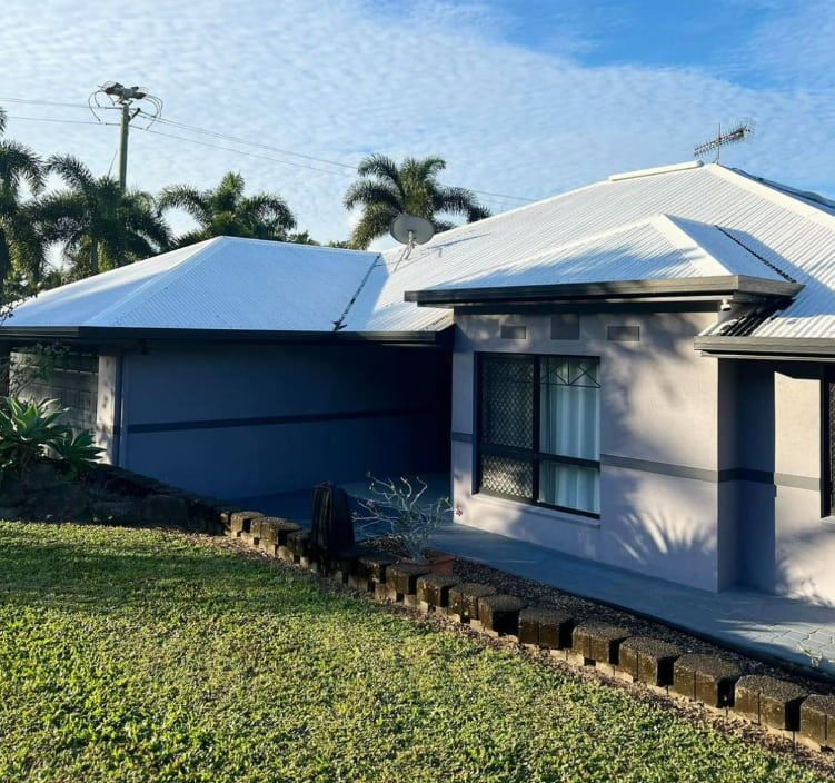 A House With A White Roof And A Lot Of Windows — All Grind & Coat in Cairns, QLD