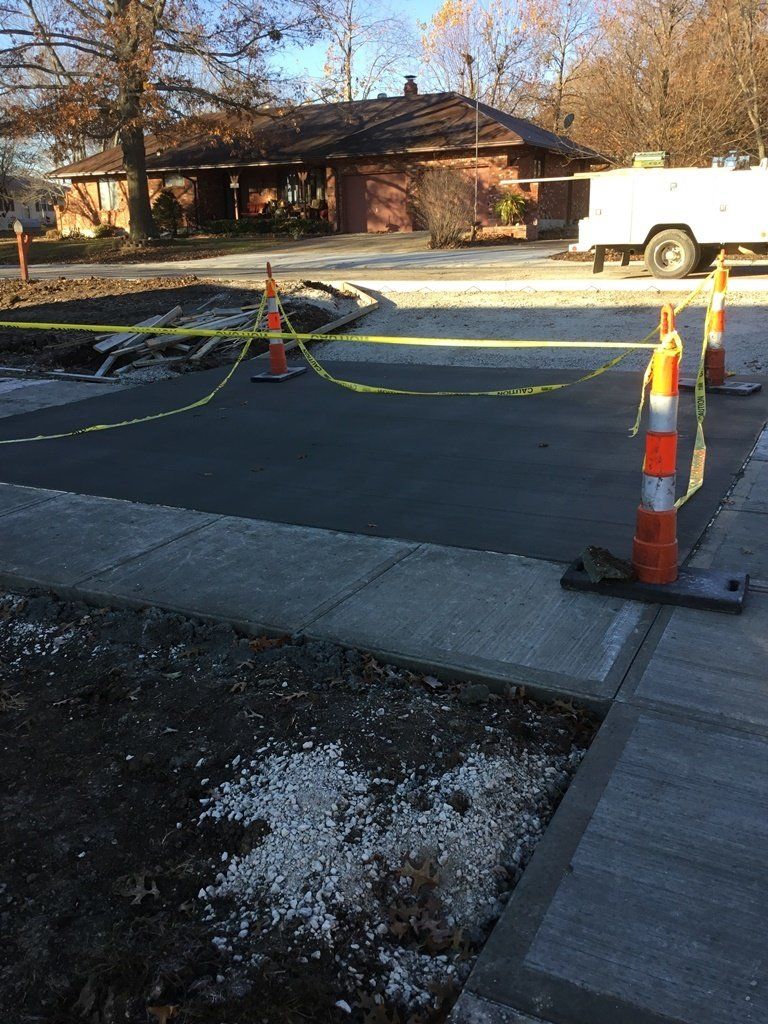 Sidewalk Under Construction — Skid Loader in Lincoln, MO