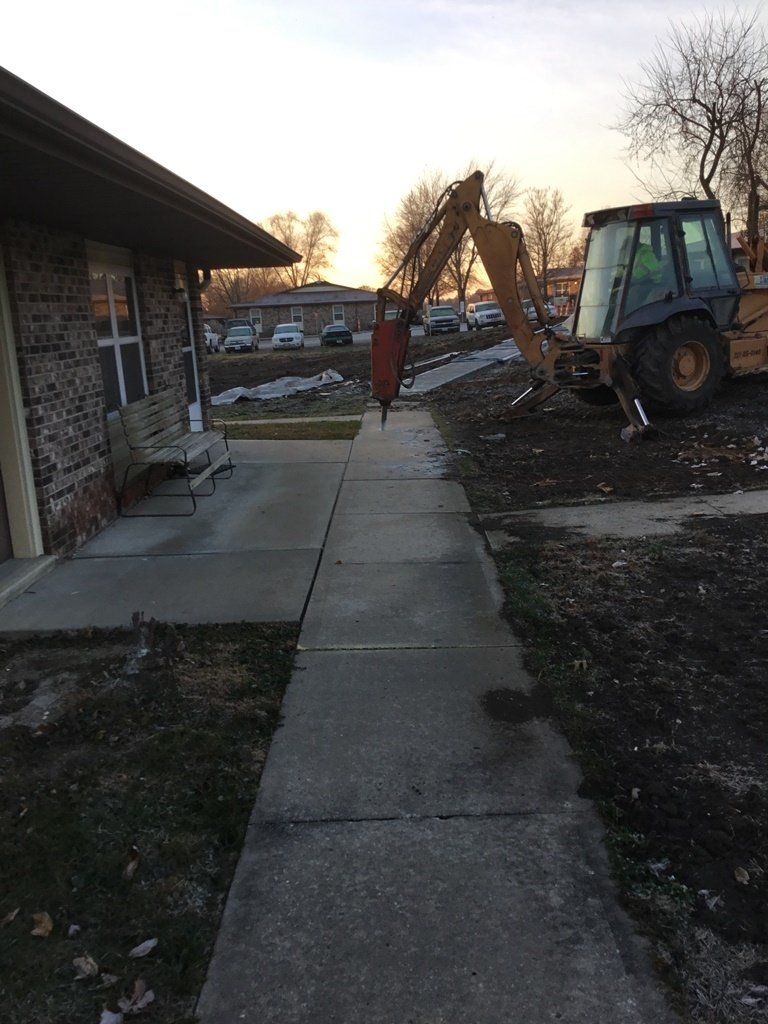 Sidewalk Construction — Skid Loader in Lincoln, MO