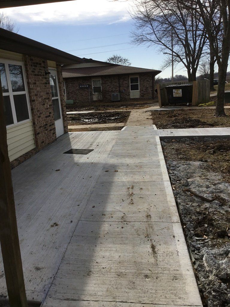 Simple Residential Sidewalk — Skid Loader in Lincoln, MO