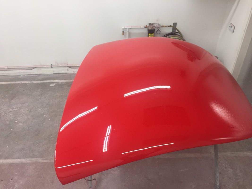 A large red object is sitting on a table