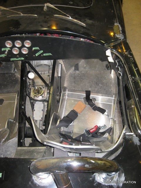 A black car with the number 7 on the dashboard