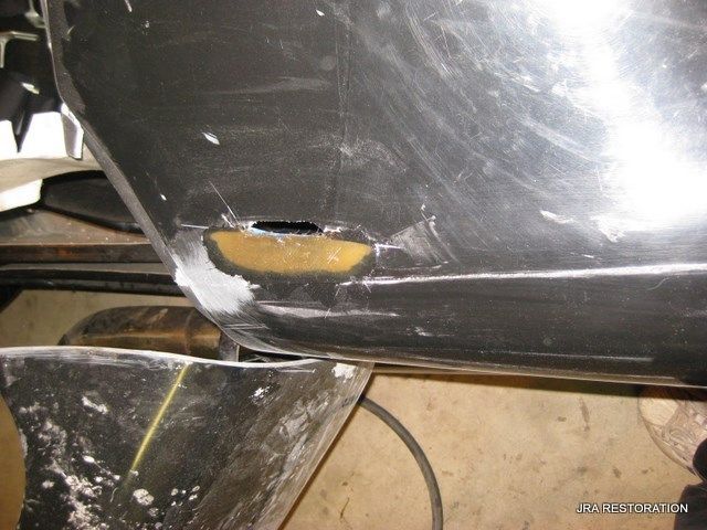 A close up of a piece of metal with a hole in it