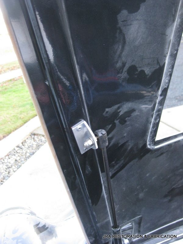 A close up of a door with the word catch on the bottom