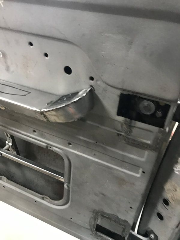 A close up of the inside of a car door.