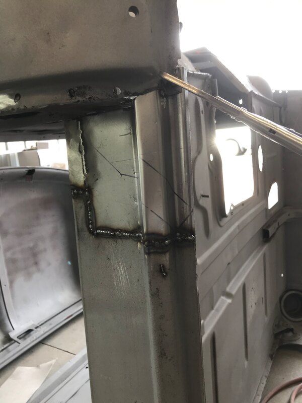 A piece of metal with a hole in the middle of it