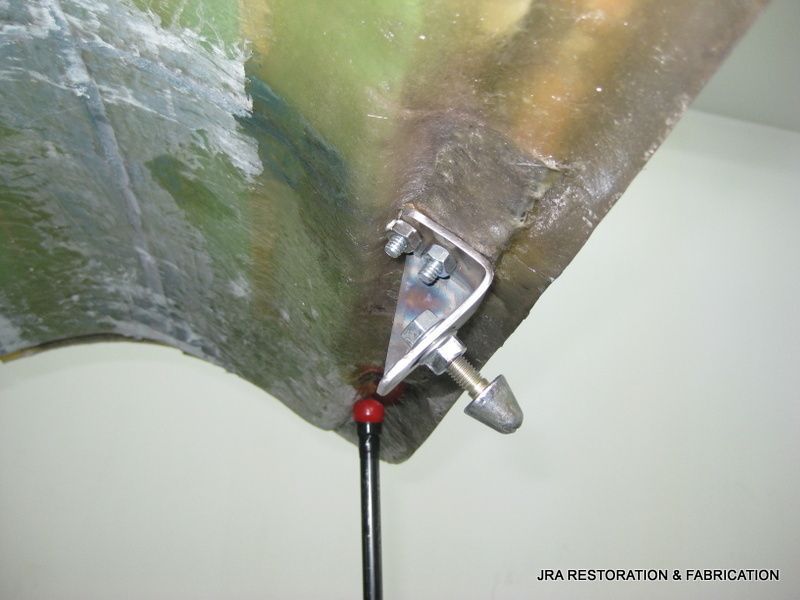 A close up of a clamp on a piece of plastic