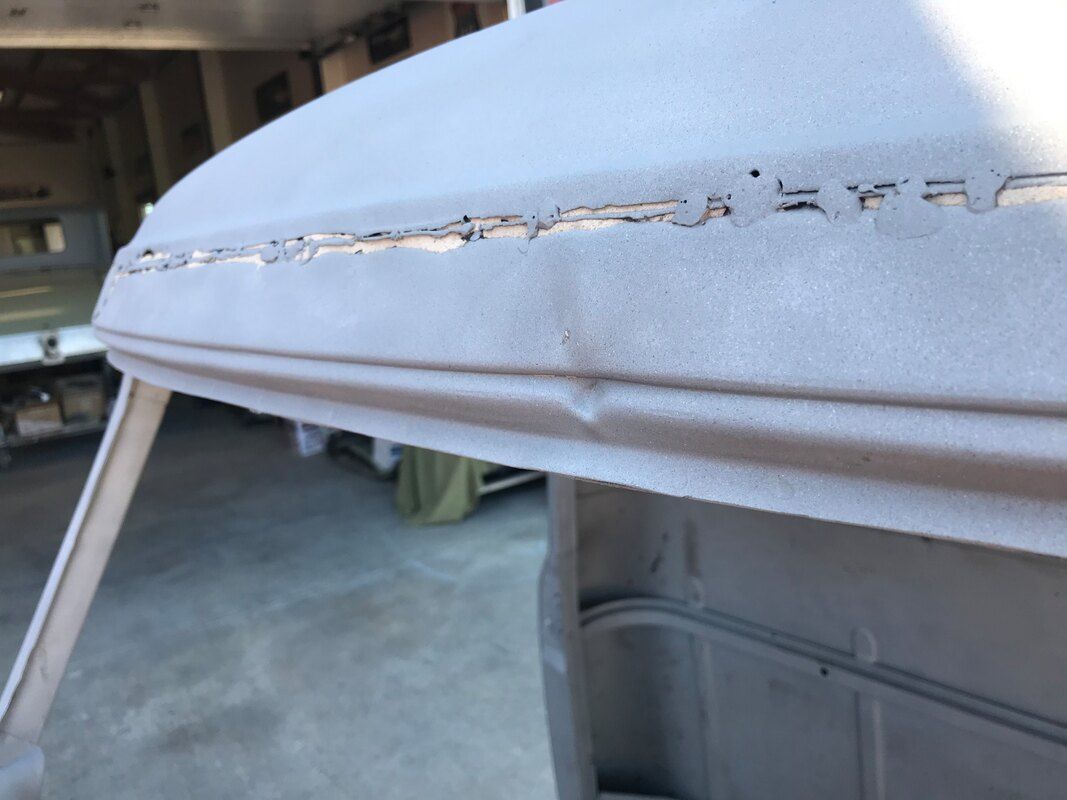 A close up of a piece of fabric with holes in it