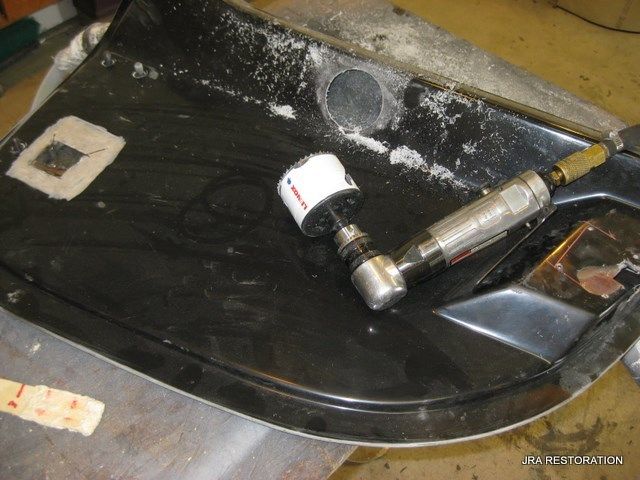 A piece of metal that has the word par restoration on it