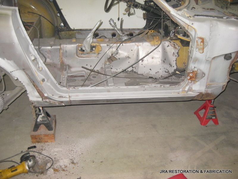 A car that is being restored by usa restoration & taxi catch