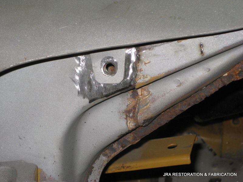 A close up of a piece of metal with a hole in it