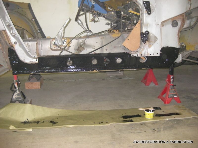 A picture of a car being restored by jra restoration