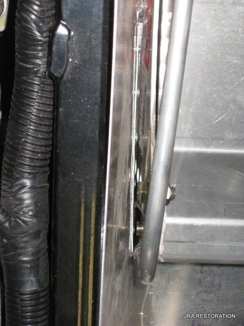 A close up of a metal item with the word pa restoration on the bottom