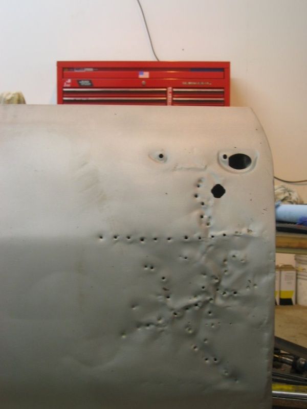 A red toolbox sits on top of a metal object