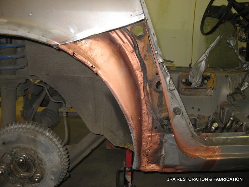A car is being restored by jra restoration & fabrication