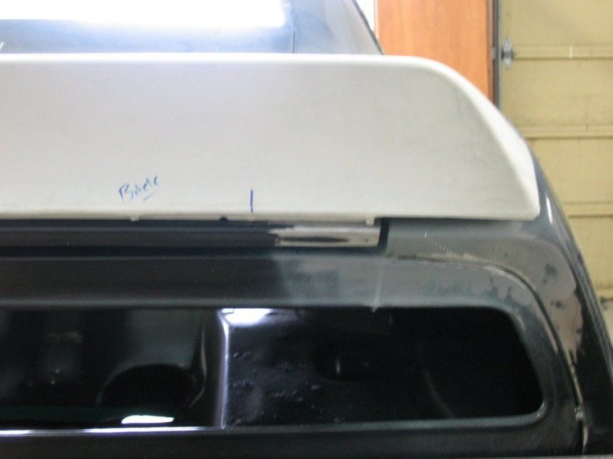 A car with a white roof and the word right written on it