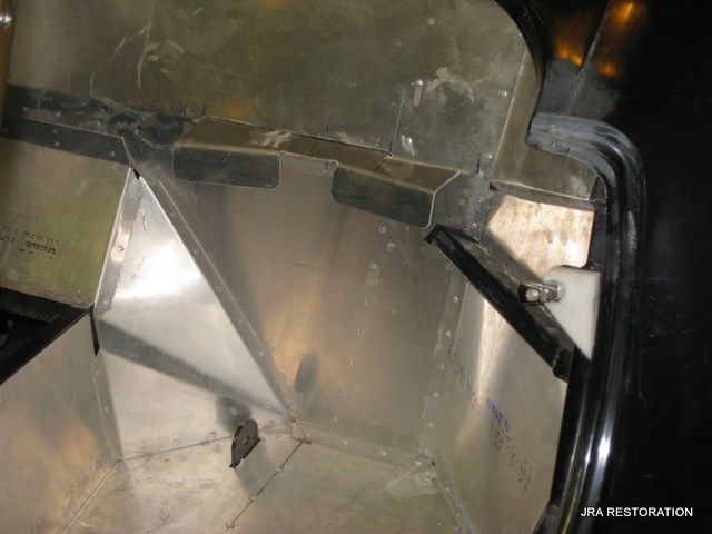 A close up of a metal item with the words jba restoration on the bottom