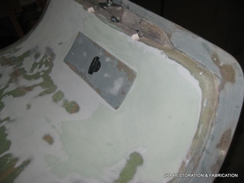 A close up of a piece of wood with a hole in it.