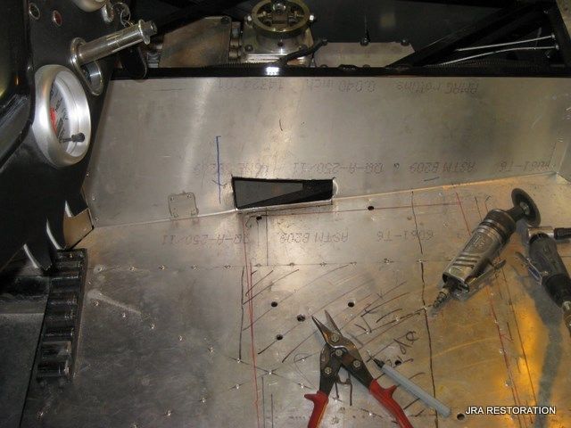 A piece of metal with a pair of pliers on it