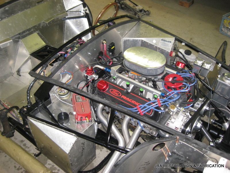 A close up of a ford engine in a car