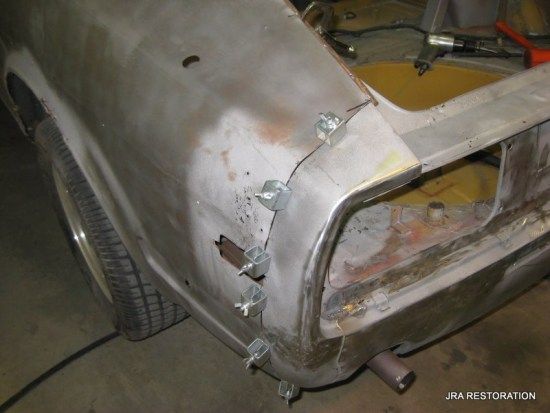 A close up of a car with the word restoration on the bottom