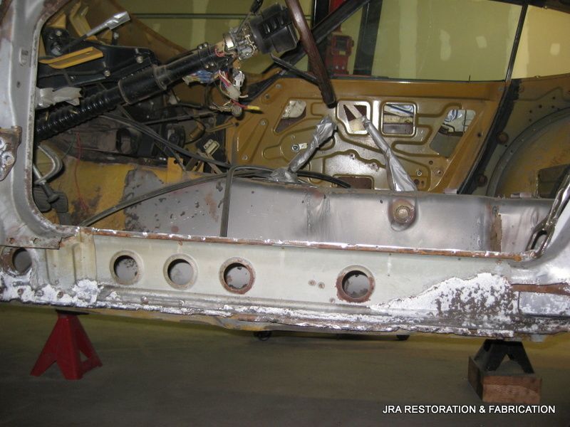 A car is being restored by jra restoration & fabrication