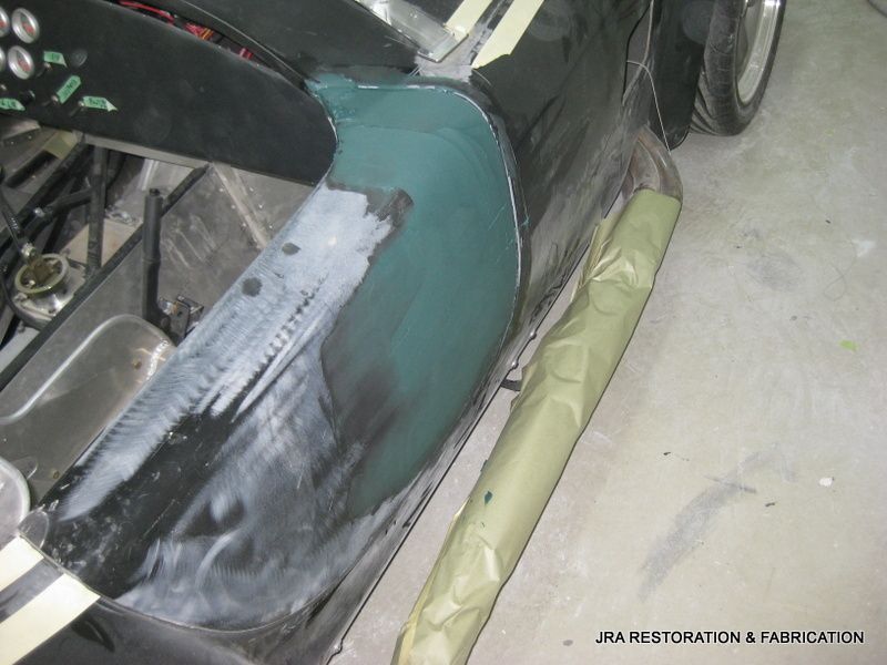 A car is being restored by jra restoration & fabrication