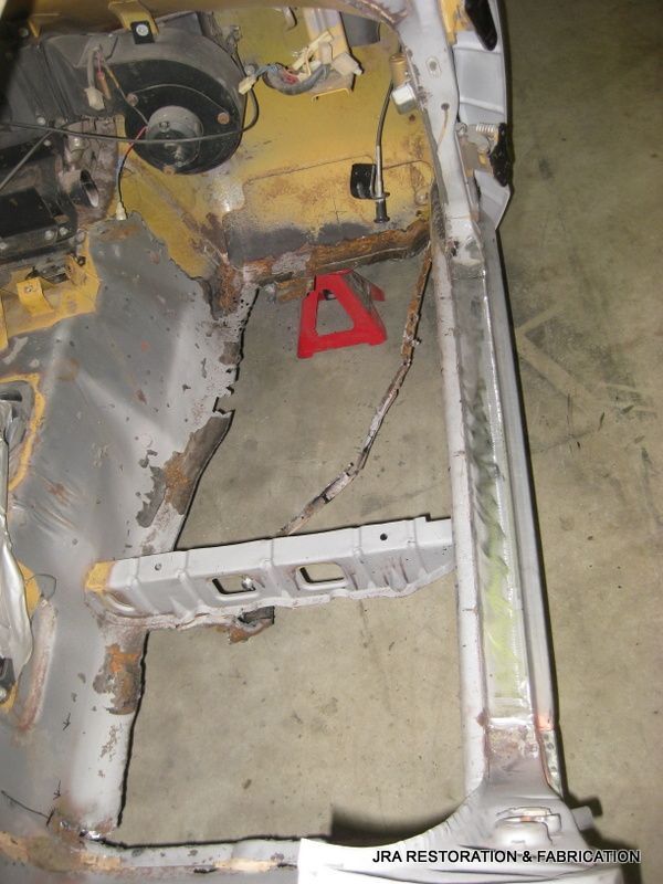 A picture of a car being restored by jra restoration & fade center