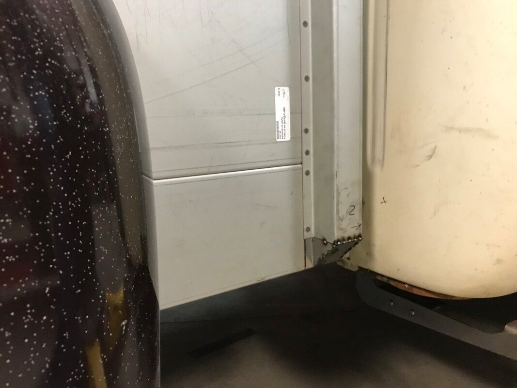 A close up of a rear fender on a truck.