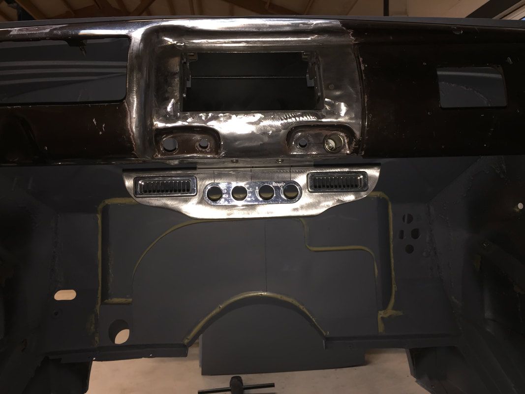 The inside of a car that is being built