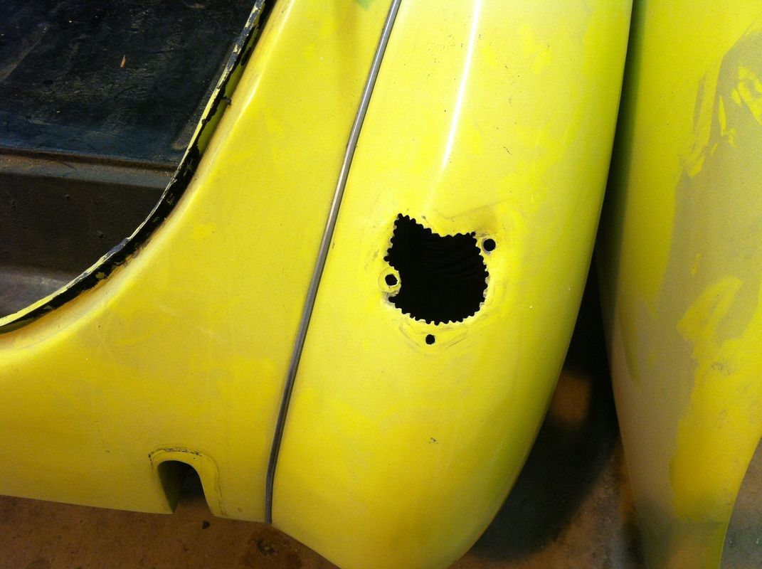 A yellow object with a hole in it