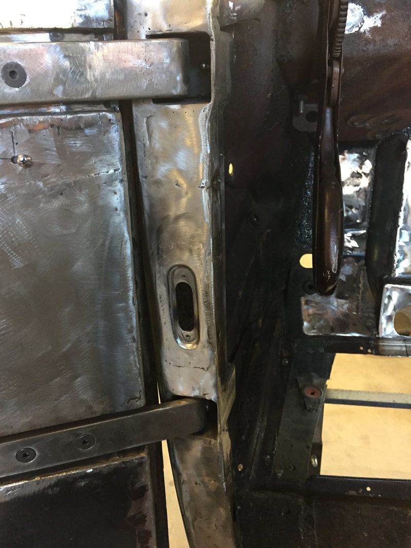 A close up of a piece of metal with a hole in it.