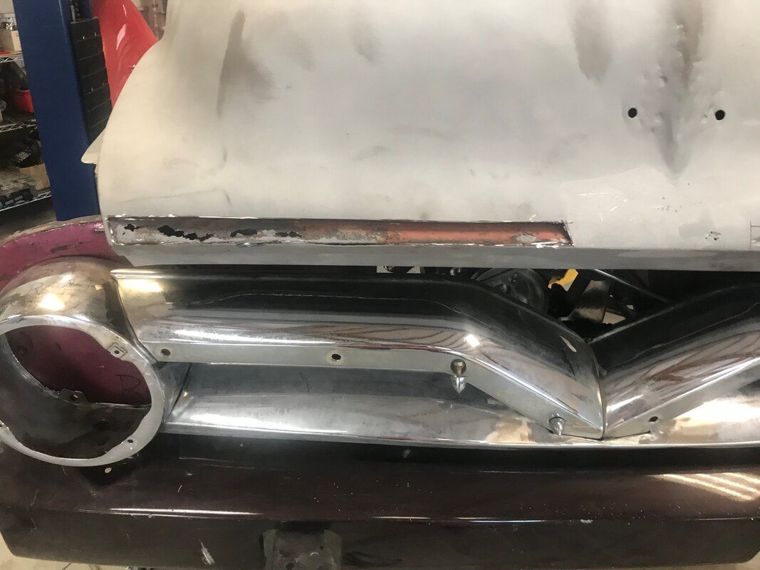 A close up of a car with a exhaust pipe on it.