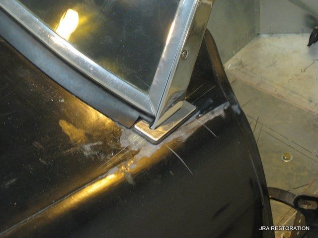 A close up of a car with the word restoration on the bottom