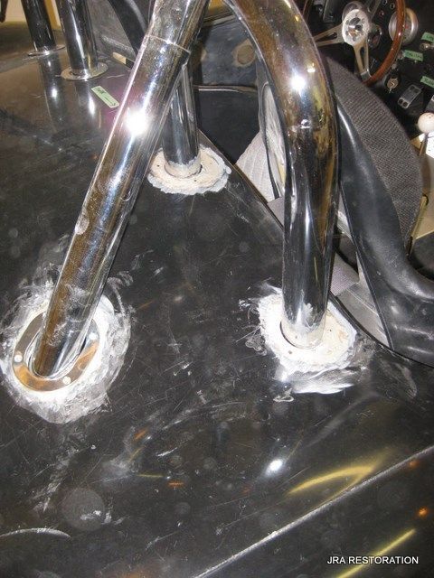 A close up of a car with the word restoration on the bottom