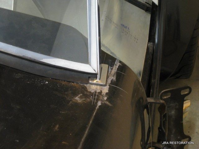 A picture of a car with the word restoration on the bottom