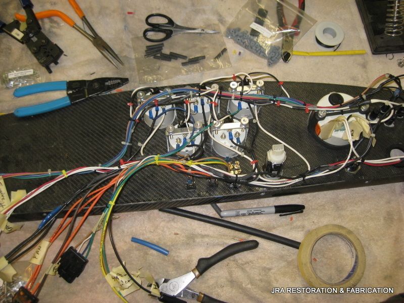 A bunch of wires are laying on a table