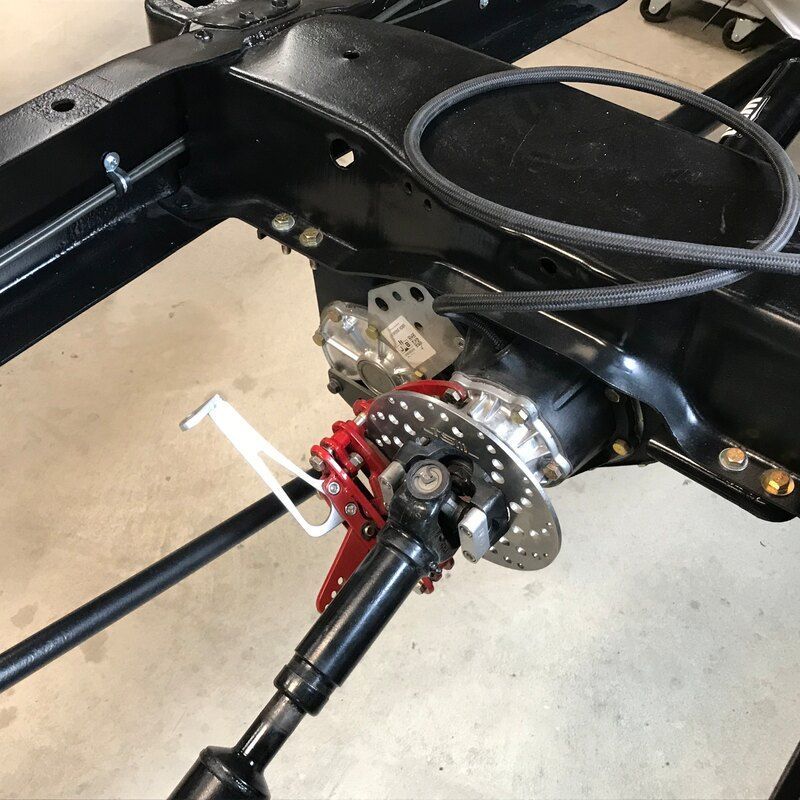 A close up of a steering wheel on a car