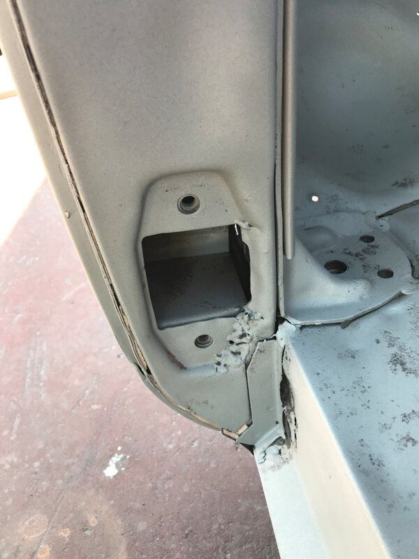 A close up of a door with a hole in it