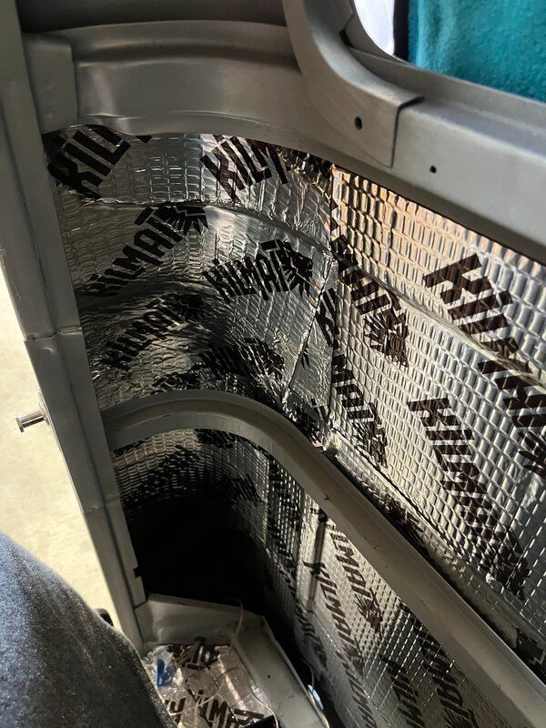 The inside of a car with a lot of insulation on it